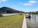 Landscaped waterfront property with private dock and canal access at 2295 Chilcote Ter, Port Charlotte, FL 33981