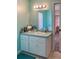 Bathroom with vanity, sink, and mirror at 23111 Mineral Ave, Port Charlotte, FL 33954