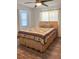 Bedroom with light wood-toned bed frame at 23111 Mineral Ave, Port Charlotte, FL 33954