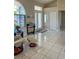 Bright entryway with tile floor and console table at 23111 Mineral Ave, Port Charlotte, FL 33954