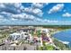 Aerial view of community with lake and town center at 24269 Spartina Dr, Venice, FL 34293