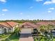 Single-Gathering home with tile roof and driveway at 24269 Spartina Dr, Venice, FL 34293