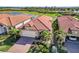 Single-Gathering home with tile roof and driveway at 24269 Spartina Dr, Venice, FL 34293