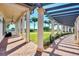 Covered patio with columns and brick flooring at 24269 Spartina Dr, Venice, FL 34293