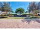 Sarasota National community entrance with brick pavers and lush landscaping at 24269 Spartina Dr, Venice, FL 34293