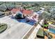 Community guard house with red tile roof and lush landscaping at 24269 Spartina Dr, Venice, FL 34293