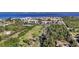 Aerial view of community highlighting its waterfront access and green spaces at 25188 Marion Ave # C206, Punta Gorda, FL 33950