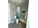 Clean bathroom with tub shower combo and updated fixtures at 254 Mark Twain Ln, Rotonda West, FL 33947