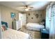 Twins bedroom with two beds and coastal decor at 254 Mark Twain Ln, Rotonda West, FL 33947