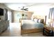 Spacious main bedroom with king-size bed, and plenty of natural light at 254 Mark Twain Ln, Rotonda West, FL 33947