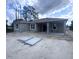 Rear view of the new construction home with covered patio at 2814 Vogler Ln, North Port, FL 34286