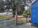 Backyard view with shed and a wooden fence at 2933 Vizza Ln, North Port, FL 34286