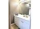 Clean bathroom with white vanity and updated fixtures at 2933 Vizza Ln, North Port, FL 34286