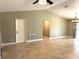 Bright living room with tile floors and a high ceiling at 2933 Vizza Ln, North Port, FL 34286