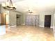 Open concept living room with tile floors and high ceilings at 2933 Vizza Ln, North Port, FL 34286