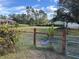 Vacant lot with a wooden fence at 2933 Vizza Ln, North Port, FL 34286