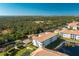 Aerial view of condo building near lake at 300 San Lino Cir # 322, Venice, FL 34292