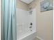 Bathroom with shower/tub combo and striped shower curtain at 300 San Lino Cir # 322, Venice, FL 34292