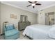 Serene bedroom with ceiling fan and plenty of natural light at 300 San Lino Cir # 322, Venice, FL 34292