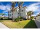 Building exterior with landscaping and palm trees at 300 San Lino Cir # 322, Venice, FL 34292