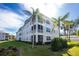 Building exterior with balconies and landscaping at 300 San Lino Cir # 322, Venice, FL 34292