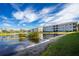 Community lake view with building reflection at 300 San Lino Cir # 322, Venice, FL 34292