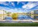 Community lake view with building reflection at 300 San Lino Cir # 322, Venice, FL 34292