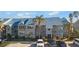 Waterfront building with teal roofs at 4410 Warren Ave # 403, Port Charlotte, FL 33953