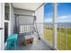 Peaceful waterfront balcony with seating at 4410 Warren Ave # 403, Port Charlotte, FL 33953