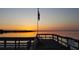 Tranquil sunset view from community fishing pier at 4410 Warren Ave # 403, Port Charlotte, FL 33953