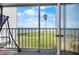 Relax on this waterfront balcony with a swing at 4410 Warren Ave # 403, Port Charlotte, FL 33953