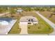 Aerial view of house and neighborhood at 48 Master Dr, Placida, FL 33946