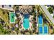 Aerial view showing resort-style pool, pickleball and bocce ball courts at 484 Casalino Dr, Nokomis, FL 34275