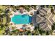 Aerial view of community pool, surrounding landscaping, and recreation areas at 484 Casalino Dr, Nokomis, FL 34275