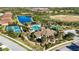 Aerial view of community amenities including pool, tennis, bocce at 484 Casalino Dr, Nokomis, FL 34275