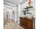 Entryway with tile flooring and a wooden console table at 484 Casalino Dr, Nokomis, FL 34275