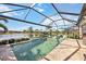 Screened pool and spa with lake views at 484 Casalino Dr, Nokomis, FL 34275