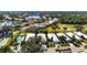 Property view showcasing a home with a pool, surrounded by other houses at 523 Fallbrook Dr, Venice, FL 34292