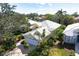 Single-Gathering home with a white roof and a two-car garage at 523 Fallbrook Dr, Venice, FL 34292