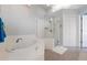 Bathroom with soaking tub and walk-in shower at 523 Fallbrook Dr, Venice, FL 34292