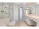 Bathroom with double vanity and glass shower at 523 Fallbrook Dr, Venice, FL 34292