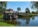 Water feature and signage at entrance to The Venice Golf and Country Club at 523 Fallbrook Dr, Venice, FL 34292