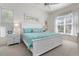 Spacious main bedroom with a king-size bed and white furnishings at 523 Fallbrook Dr, Venice, FL 34292