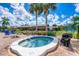 Relaxing community hot tub with surrounding seating at 545 Foxwood Blvd # 23, Englewood, FL 34223