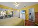 Bright bedroom leading to the bathroom and lanai, offering a peaceful retreat at 6543 Coliseum Blvd, Port Charlotte, FL 33981