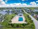 Aerial view of community pool offering a great amenity for residents at 6800 Placida Rd # 122, Englewood, FL 34224