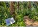 Entrance to a wooded nature trail at 717 Tangerine Woods Blvd, Englewood, FL 34223