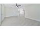 Open concept living area with tile floors at 7329 Mamouth St, Englewood, FL 34224