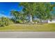 Spacious lot with mature tree and view of neighborhood at 7329 Mamouth St, Englewood, FL 34224