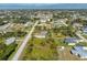 An aerial view of a single-story house on a spacious lot at 7442 Clearwater St, Englewood, FL 34224